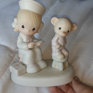 Precious moments nurse one